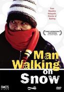 Man Walking On Snow